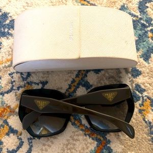 Prada shades. Very loved/Used Prada’s.